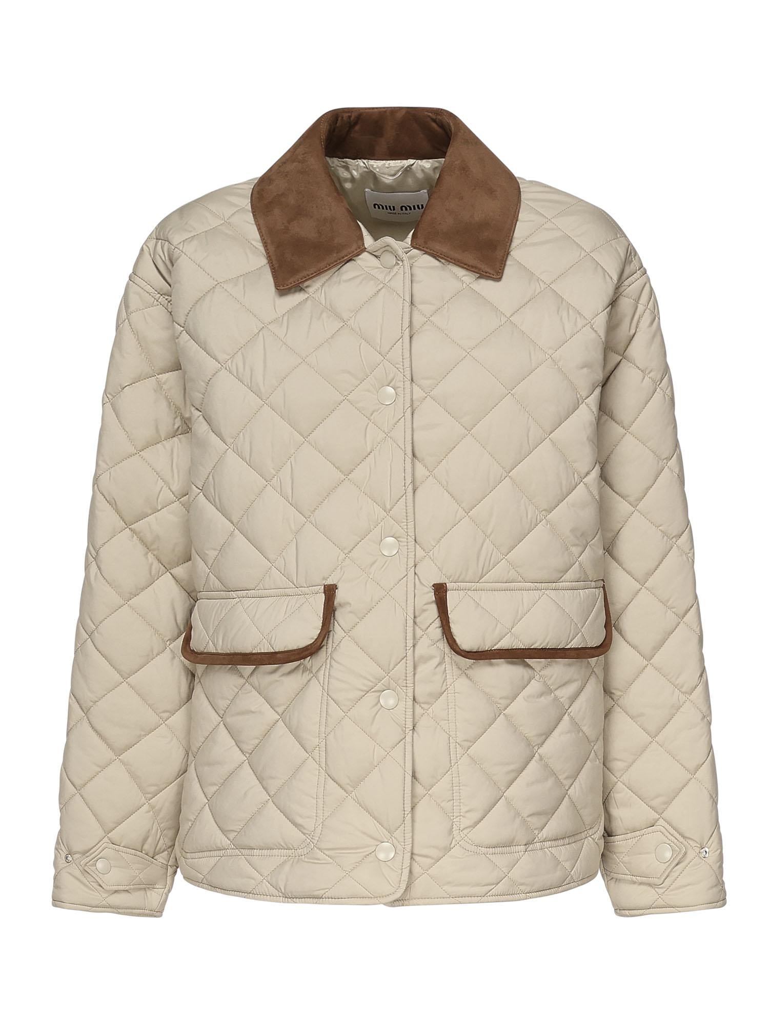 Giubbotto trapuntato con finiture a contrasto<BR/><BR/> ML1311 17OOF0036 MIU MIU 